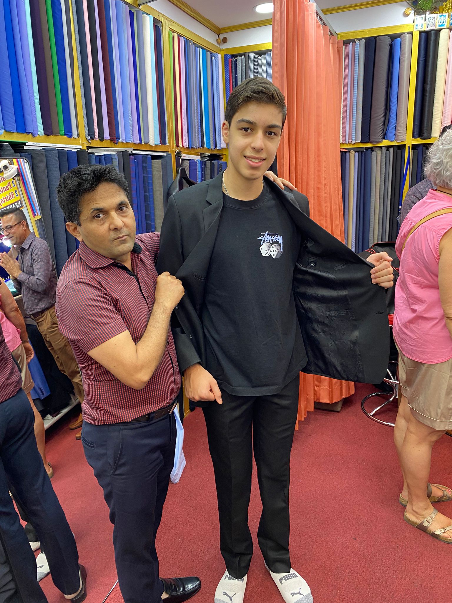 Happy client in custom tailored suit at King Fashion Uni Bangkok